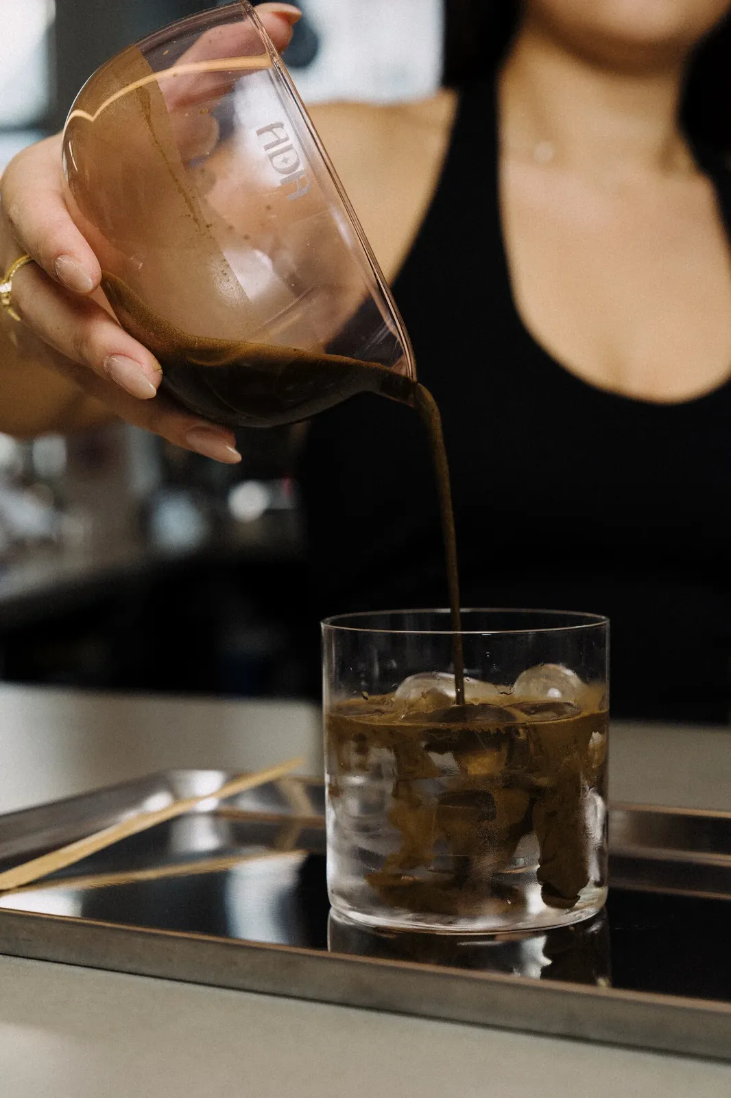 Ada Studio glassware presented in a dark hospitality setting